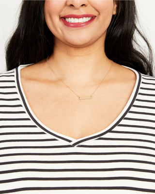 Woman wearing a gold necklace with a white and black striped shirt. This t-shirt is the Concord T-Shirt sewing pattern from Cashmerette.