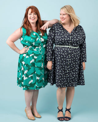 Two women wearing patterned dresses against a light blue background. This dress is the Lenox Shirtdress sewing pattern from Cashmerette.