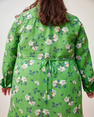 Green floral dress worn by a person on a white background. This dress is the Winvale Dress & Tunic sewing pattern from Cashmerette.