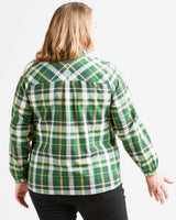 Person wearing a green plaid shirt on a white background. This top is the Vernon Shirt sewing pattern from Cashmerette.