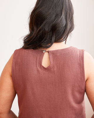 Brown sleeveless top worn by a person with a plain background. This top is the Thorndike Tank sewing pattern from Cashmerette.