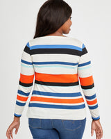 Woman wearing a striped long-sleeve shirt with a white background. This t-shirt is the Concord T-Shirt sewing pattern from Cashmerette.