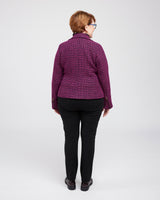 Person wearing a purple quilted jacket on a white background. This biker jacket is the Canton Moto Jacket sewing pattern from Cashmerette.