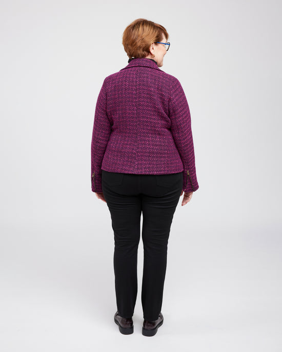 Person wearing a purple quilted jacket on a white background. This biker jacket is the Canton Moto Jacket sewing pattern from Cashmerette.