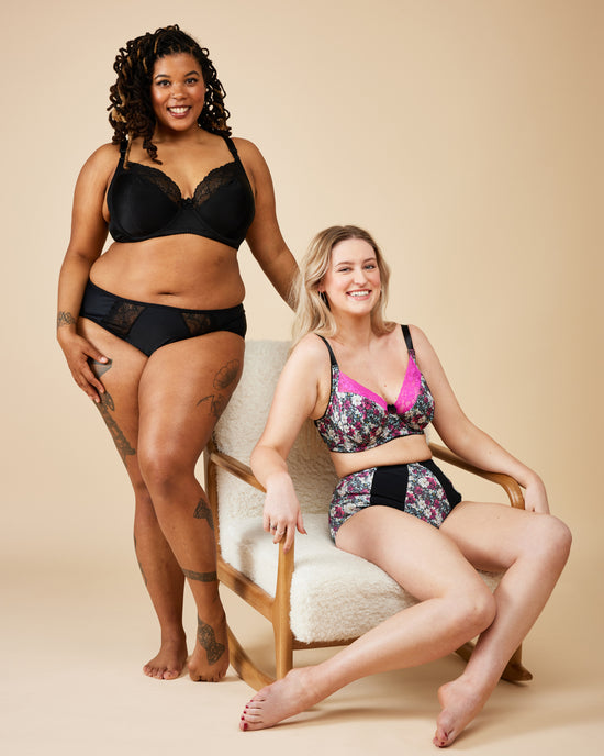 Two women wearing lingerie on a beige background. This bra is the Willowdale Bra sewing pattern from Cashmerette.