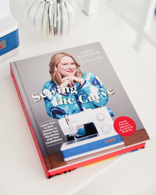 Sewing the Curve book by Jenny Rushmore on a white table
