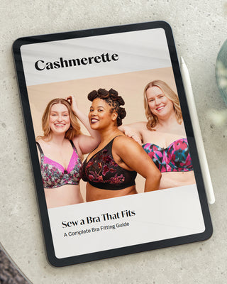 Cashmerette bra fitting guide on a tablet with three women wearing bras. This is the Cashmerette Sew a Bra That Fits ebook.