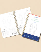 Two fashion design sketchbooks with templates on a beige background