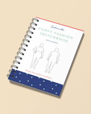 Curvy Fashion Sketchbook with spiral binding on a beige background